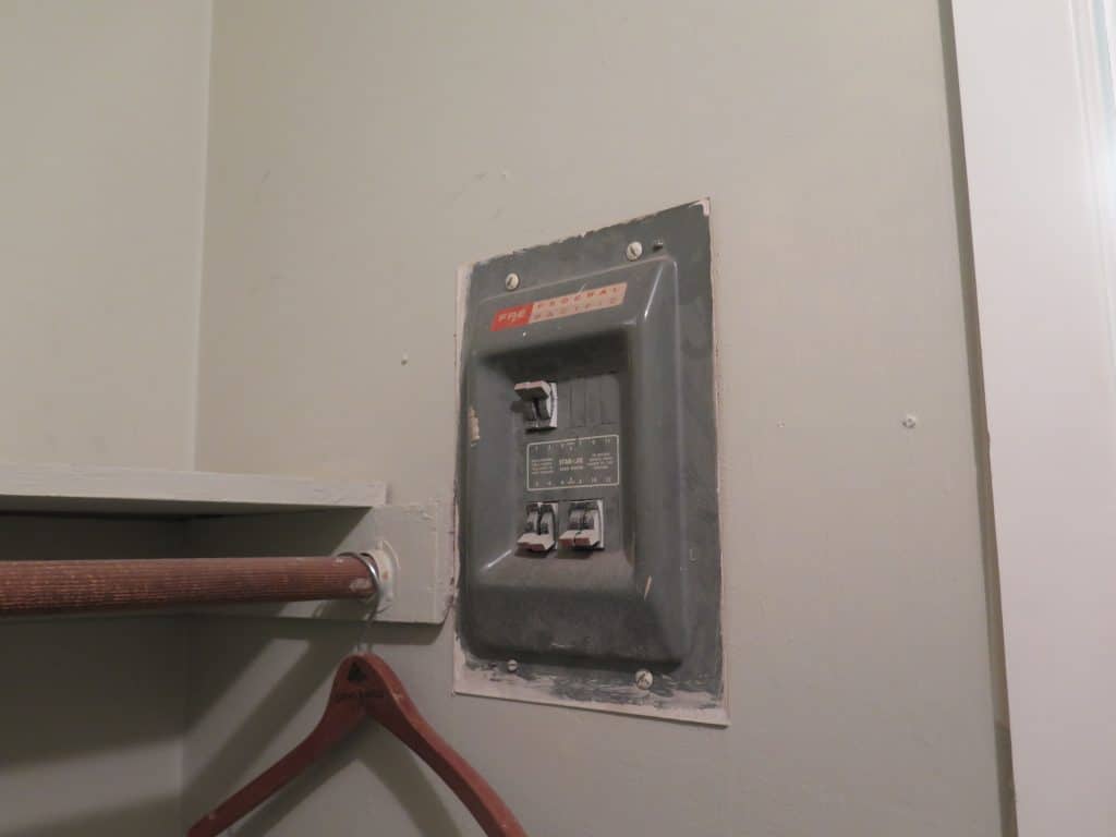 old circuit breaker that poses fire hazard discovered during property inspection